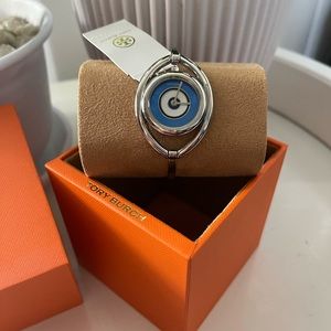 Brand new with and box tory burch eye watch,silver toned